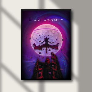 May include: A digital art print featuring a silhouette of a person with outstretched arms standing in front of a large, pink moon with a purple ring around it. The background is a dark purple with a large, dark building in the foreground. The text "I AM ATOMIC" is at the top of the print.