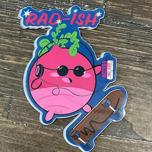 May include: A pink radish with a green leafy top, wearing sunglasses and headphones, is skateboarding. The radish is holding a cassette tape that says "RAD-ISH" on it. The background is blue with white stars and the text "RAD-ISH" in red letters.