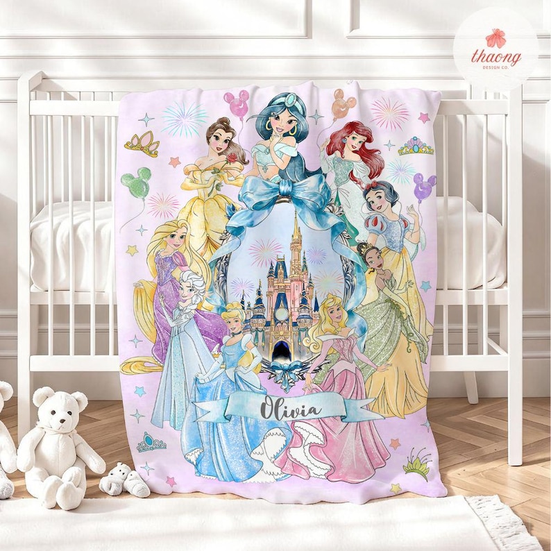 May include: A light purple fleece blanket featuring a central illustration of a castle surrounded by various animated princesses in colorful gowns, with balloons, fireworks, and a blue ribbon banner displaying the name Olivia in black script.
