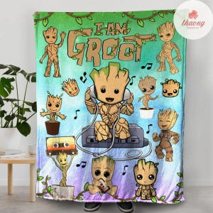 May include: A colorful fleece blanket featuring a repeating pattern of the character Groot from the Guardians of the Galaxy movie franchise. The blanket features a variety of Groot characters in different poses, including Groot playing music on a cassette player, Groot holding a cassette tape, and Groot standing with his arms raised. The blanket also features the text "I AM GROOT" in a green and white font.