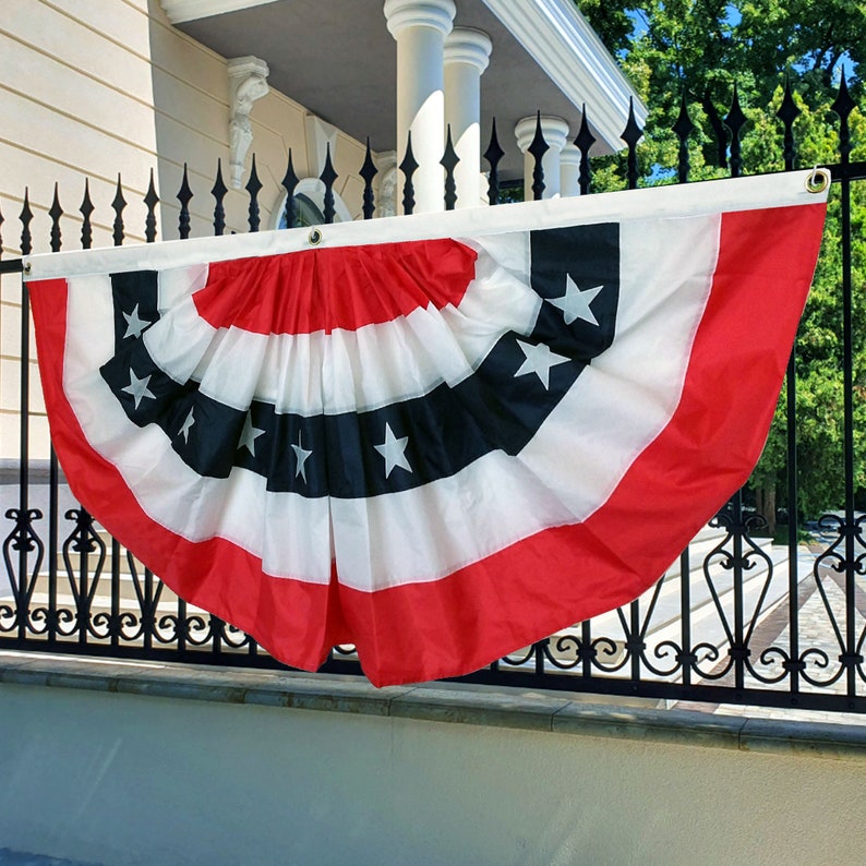 Patriotic Bunting Flag displayed on the fence.