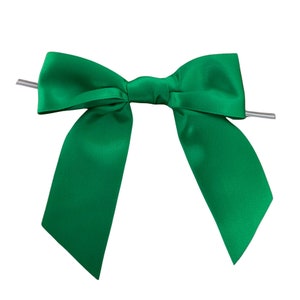 May include: A green satin bow with a wire loop for attaching to a gift or package.