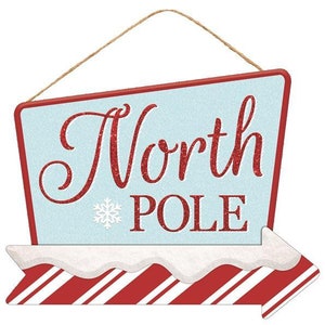 North Pole Arrow Christmas Sign - 12.5&quot; x 10&quot;, Light Blue, Red and White Wooden Home Decor, Candy Cane Stripes, Wreath