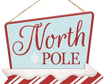 North Pole Arrow Christmas Sign - 12.5" x 10", Light Blue, Red and White Wooden Home Decor, Candy Cane Stripes, Wreath