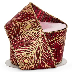 May include: Red and gold ribbon with a peacock feather design. The ribbon is 2.5 inches wide and has a wired edge.