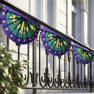 May include: Three purple, green, and gold Mardi Gras fan-shaped flags with fleur-de-lis designs hanging on a black metal railing.