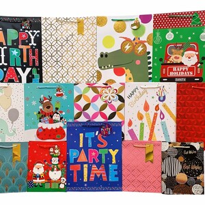 May include: Assortment of colorful gift bags with various designs, including birthday, holiday, and general occasion themes. The bags feature festive patterns, illustrations, and text like "Happy Birthday", "Happy Holidays", and "It's Party Time".