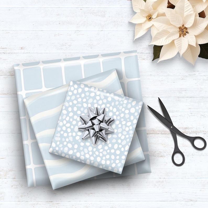 Dusty blue soft geometry seamless patterns, shown as sublimation on wrapping paper.