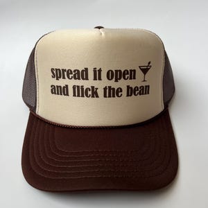 Spread it open and Flick the Bean Trucker Hat - Funny Trucker Hats