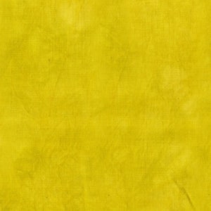 May include: A solid yellow fabric background with a subtle texture.
