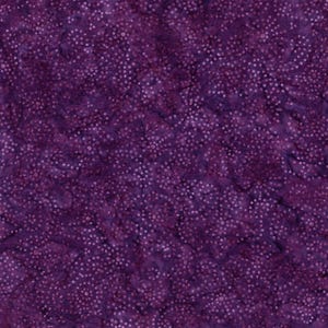May include: A deep purple fabric featuring a batik-style texture with a dense, repeating pattern of tiny, light-colored dots scattered across the surface. The material displays subtle variations in color saturation, creating a mottled appearance.