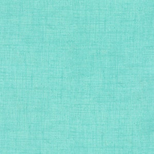 May include: A close-up of a textured fabric in a solid, light turquoise colour. The fabric has a crosshatch pattern, creating a subtle grid-like appearance. The overall effect is a soft, muted aesthetic, suitable for various craft and design projects.