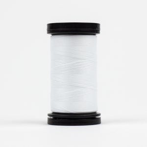 May include: A spool of white thread with a black plastic top and bottom.