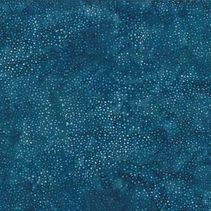 May include: A teal blue fabric with a white speckled pattern. The fabric has a subtle, mottled texture.