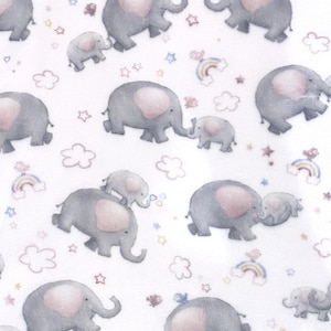 May include: A white background is covered with a repeating pattern of gray elephants with pink ears and bellies. The design includes small rainbows, clouds, stars, and birds in pastel colors, creating a whimsical nursery theme.