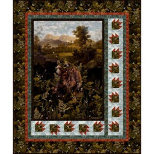 May include: A decorative quilt with a central image of a brown bear in a forest. The bear is surrounded by ferns and foliage, with a mountain landscape in the background. The quilt has a border with bear paw prints.