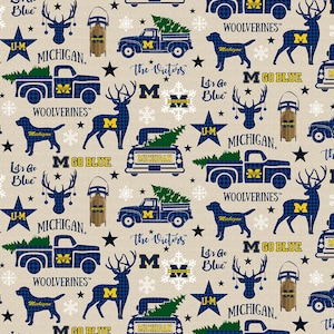 Sykel Enterprises~Holiday NCAA Prints~Univ. of Michigan Wolverines~Christmas Allover~Blue~Cotton Fabric by the Yard MCHG-1213