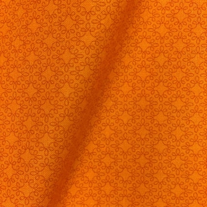 May include: Orange fabric with a repeating pattern of small, intricate, orange-colored swirls.