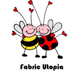 May include: A cartoon bee and ladybug hugging, with red hearts around them. The bee is yellow and black with a pink face. The ladybug is red with black spots and a pink face. The text "Fabric Utopia" is below the image.