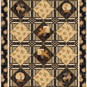 May include: A quilt with a black and gold geometric pattern. The quilt features a repeating design of diamonds and squares. The center of each diamond features a different image, including a deer, a bird, and a Christmas ornament.