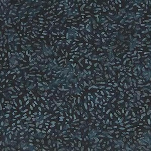 May include: A dark blue fabric with a scattered pattern of light blue, irregular shapes. The fabric has a subtle, mottled texture.