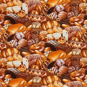 Puede incluir: Una imagen de primer plano de una variedad de productos horneados, que incluyen panes, bollos y pasteles. La imagen está llena de tonos cálidos y texturas marrones doradas.