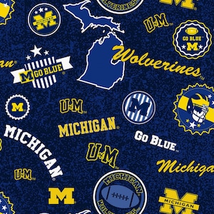 EOB~Sykel Enterprises~College Cottons~Michigan Wolverines Home State Cotton~Blue/Gold~Cotton Fabric by the Yard MCHG-1208