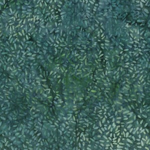 May include: A teal and dark green fabric featuring a dense, repeating pattern of small, light-colored, elongated oval shapes that resemble scattered rice grains or petals, creating a textured, mottled appearance across the entire surface.