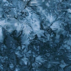 May include: A fabric swatch featuring a tie-dye pattern in various shades of deep navy, slate blue, and white. The design displays a mottled, cloud-like texture with organic, swirling shapes that transition from dark indigo tones to lighter blue.