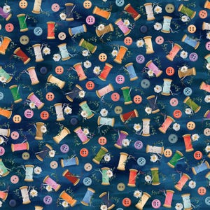 May include: A seamless pattern featuring spools of thread in various colors, scattered with buttons and small white flowers on a dark blue background. The spools are in shades of pink, orange, green, and cream.