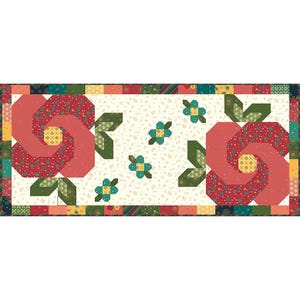 May include: A patchwork quilt runner with a floral design. The runner features two large red and pink roses with green leaves and smaller green and yellow flowers scattered across the background. The runner has a border of green, red, and yellow patchwork squares.