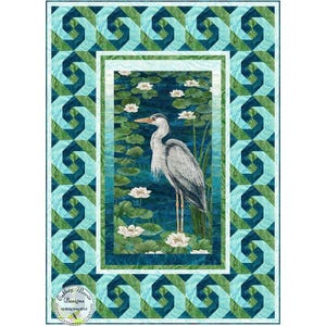 May include: A quilt pattern featuring a blue heron standing in a pond with lily pads. The pattern is surrounded by a teal and aqua geometric border.