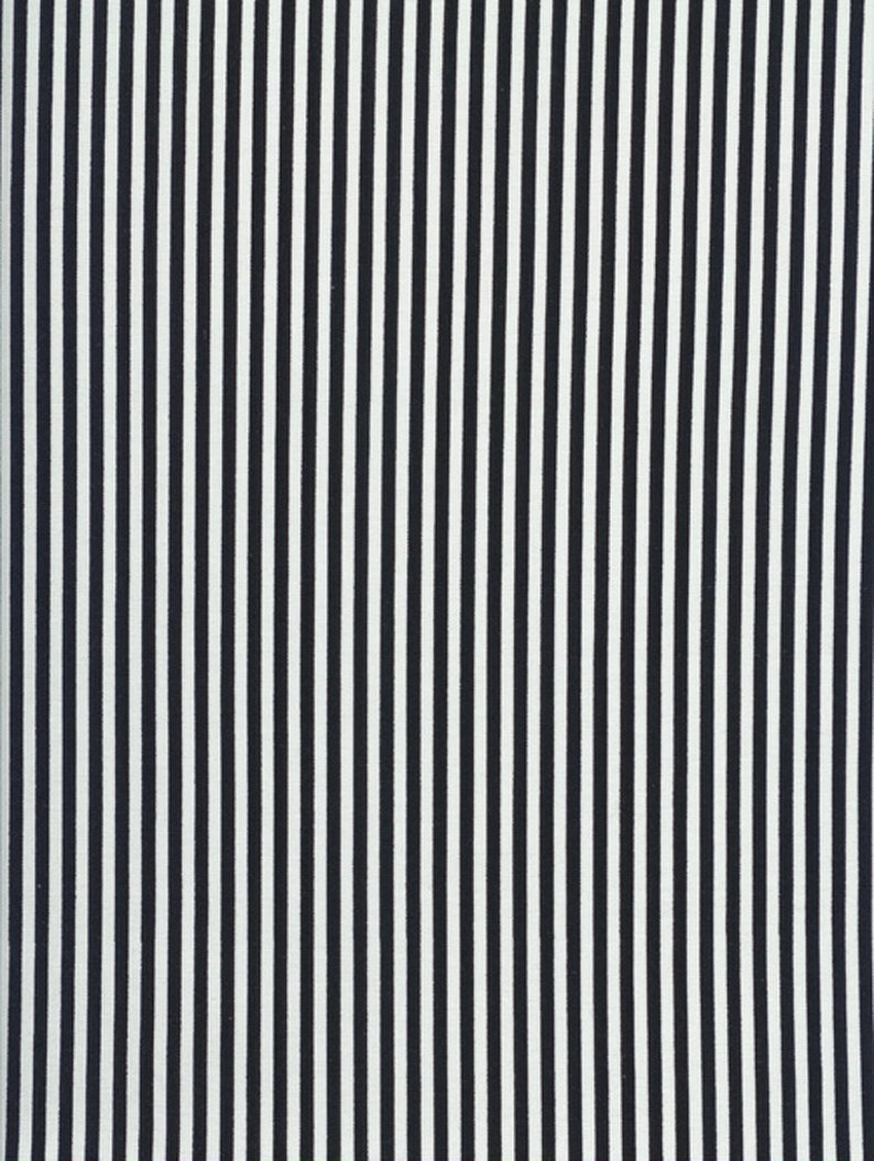 May include: Black and white striped fabric with a subtle texture. The stripes are evenly spaced and create a classic pattern.