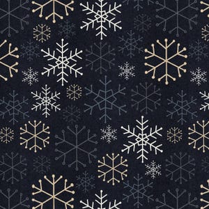 May include: A repeating pattern of snowflakes in white, gold, and grey on a dark navy blue backdrop. The snowflakes vary in size and have intricate designs, suitable for winter or festive projects.
