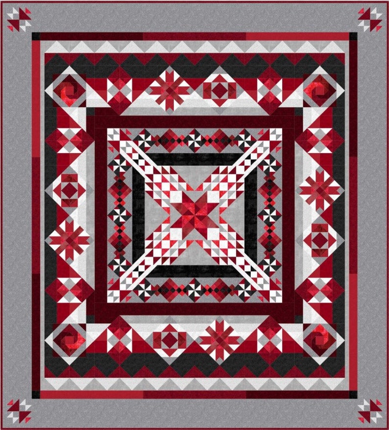 以下が含まれることがあります： 赤、白、黒の幾何学模様のキルト。キルトは正方形と三角形で構成されており、中央に星形のデザインがあります。