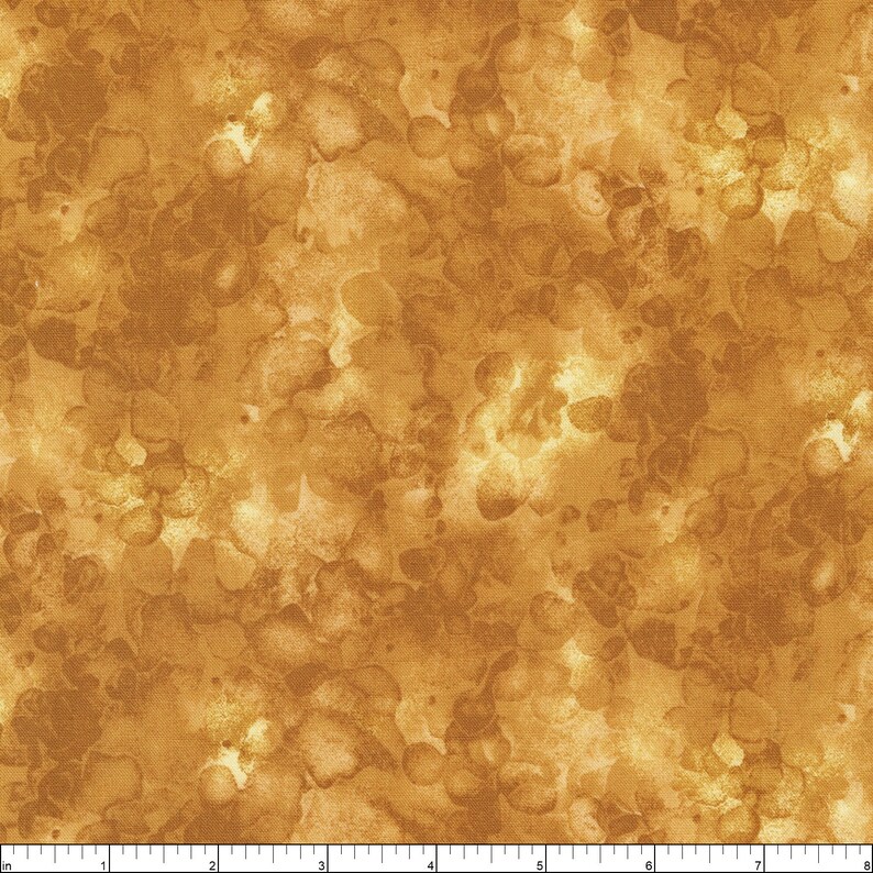 May include: A seamless fabric with a watercolor-like pattern in shades of gold and brown. The design features irregular, organic shapes that create a mottled effect. The fabric has a textured appearance, suggesting a woven material.