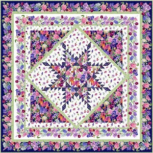 May include: A quilt with a starburst pattern in the center, surrounded by a border of floral designs. The quilt is made with a variety of fabrics in shades of pink, purple, blue, and green.