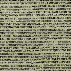 May include: A repeating pattern of black gothic letters and symbols on a light beige background. The letters are arranged in horizontal rows, creating a textured, vintage aesthetic. The design is suitable for fabric or paper.