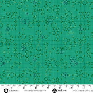 May include: Teal fabric featuring a grid pattern with randomly placed green and blue circles of different sizes. A ruler is along the bottom edge, with the Andover Fabrics logo and website.