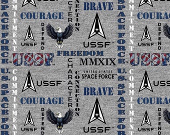 May include: Grey fabric with a repeating pattern featuring the USSF logo, an eagle, and the words "Courage," "Brave," and "Freedom." The design includes the text "United States Space Force" and "MMXIX."