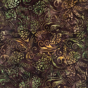 May include: A fabric with a dark brown background featuring a repeating pattern of green and gold stylized leaves and swirling, decorative elements. The design has a batik-like appearance, with variations in color and texture.