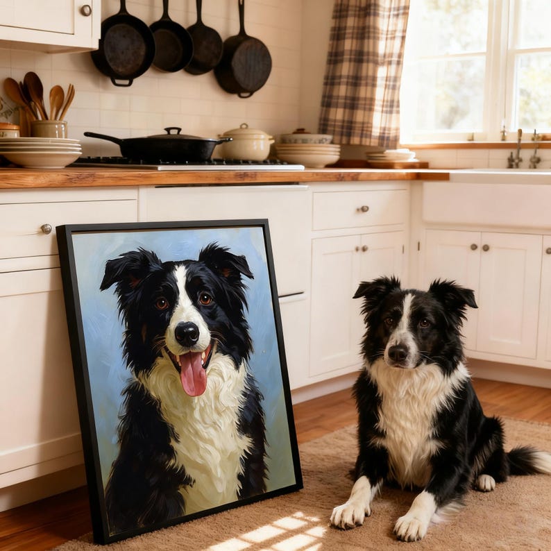 May include: A framed portrait of a black and white Border Collie dog with a blue background, next to a real Border Collie dog. The dog in the portrait has its tongue out. The dog is lying on a brown rug in a kitchen.