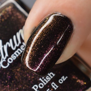 Black Nail Polish with Burgundy to Gold Shifting Shimmer STEROPE