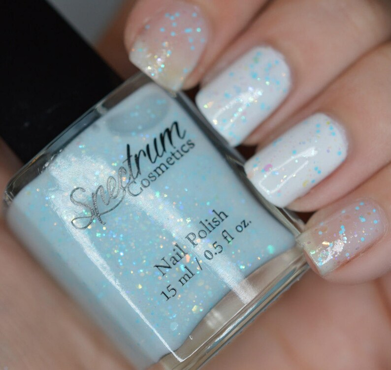 Ice Blue Crelly Polish With Iridescent And Blue Glitter Nail Etsy Ice Blue Crelly Polish With Iridescent And Blue Glitter Nail Etsy