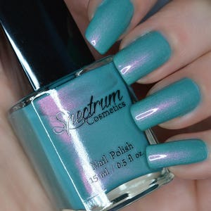 SIRENS SONG Shimmery teal nail polish with Pink iridescence