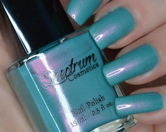 SIRENS SONG Shimmery teal nail polish with Pink iridescence