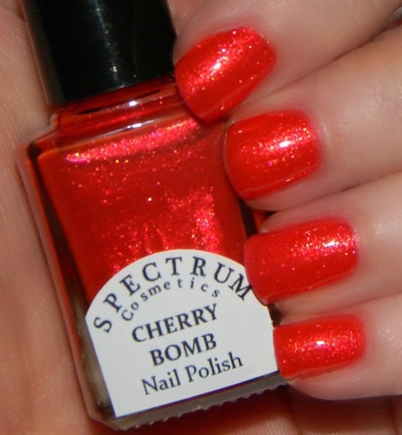CHERRY BOMB Red Nail Polish with Gold Shimmer image 1