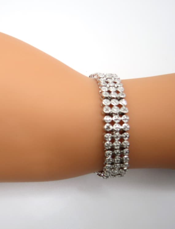 Stainless steel and diamond bracelet.