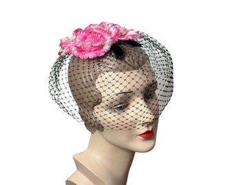 1960s pink flower fascinator hat with veil