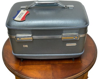 Vintage American Tourister train case with mirror and tray